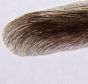 Individual hairs on men's eyebrow wig.