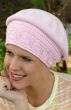 pink beret with detailed stitching conceals hair loss