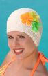 Woman in white rubber molded swim cap with colorful flowers on the side