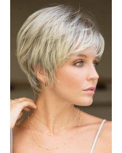 Woman in a platinum blonde semi-asymmetric short bob wig with a side part and side bangs