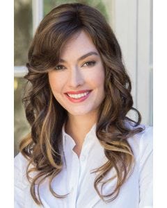 Woman in a 16"dark brown curly hair topper for thinning hair