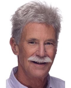 Older man in short, textured light grey toupee wig hairpiece
