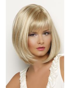 Woman in a shoulder length light blonde bob wig with face framing layers and feathered bangs