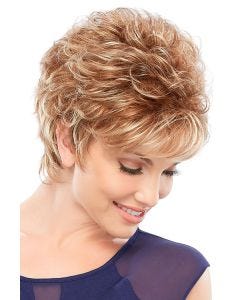 Woman in a petite curly auburn highlighted pixie wig with side swept bangs