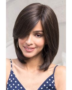 Woman in dark brown long bob wig with bangs