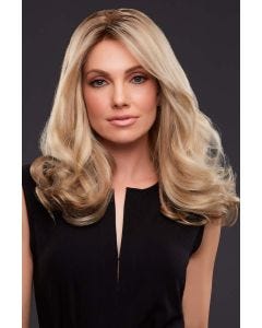 Woman in past the shoulders curly blonde wig with darker roots