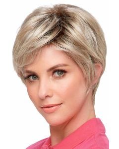 Woman in a light ash blonde asymmetrical pixie wig with long layers