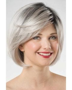Woman in a past the chin silver rounded lace front bob wig with side bangs