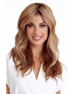 Woman in an extra long red blonde wig with beach waves and curtain bangs