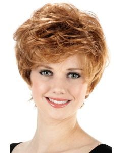 Woman in a long light auburn messy pixie wig
