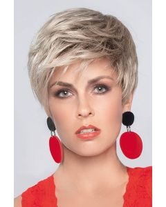 Woman in a long light blonde pixie wig