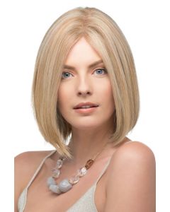 Woman in a shoulder length curled under dark blonde blunt human hair bob wig