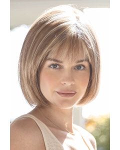 Woman in brown short chin length bob wig with layers and bangs