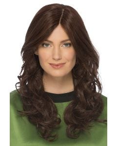 Woman in an extra long curly dark brown human hair wig with long curtain bangs