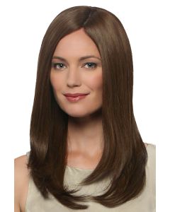 Woman in an extra long straight medium brown human hair wig with long layers
