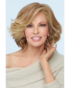 Raquel Welch in a shoulder length light auburn layered curly lace front wig