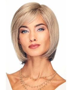 Woman in straight, shoulder length light brown bob lace front wig with bangs