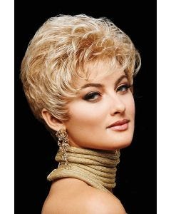 Woman in a petite curly light brown pixie wig with longer layers on the top and back