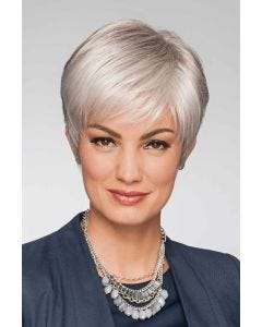 Woman in a light grey classic pixie wig with longer layers on top and side bangs