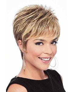 Woman in a layered blonde pixie wig with longer layers on top