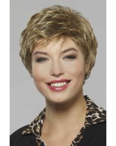 Woman in a wavy textured blonde pixie wig