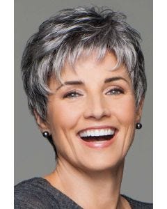 Happy woman in a classic grey pixie wig with shaggy textured bangs
