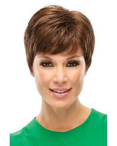 Woman in a classic auburn pixie wig with side fringe bangs
