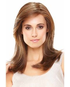 Woman in a reddish brown past-the-shoulders wig with textured layering on the ends