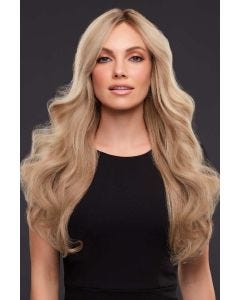Woman in an extra long light golden brown and blonde curly remy human hair lace front wig with dark roots