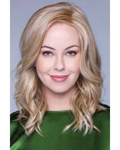 Woman in a past the shoulders curly red blonde lace front wig