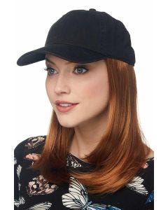 Woman in a black baseball cap with long straight hair attached