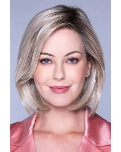 Woman in a past the chin light blonde lace front bob wig