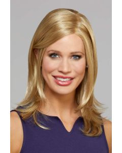 Woman in a past the shoulders light straight gold blonde lace front wig with long layers