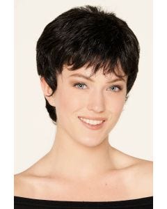 Woman in a large close cropped dark brown pixie wig with wispy bangs