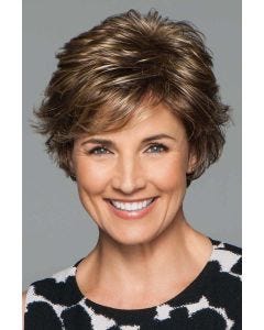 Woman in a petite medium brown short layered pixie bob wig with side fringe bangs