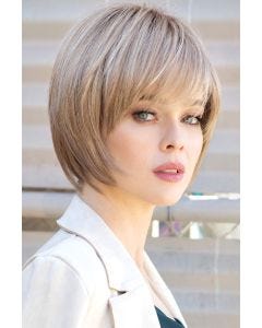 Woman in blonde, short, straight chin length bob wig with layers