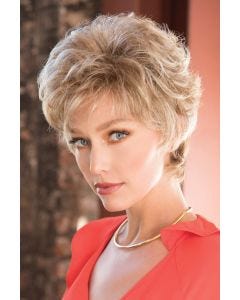 Woman in short curly blonde wig for older women