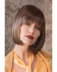 Woman in brown blunt cut bob wig with bangs