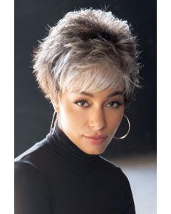 Woman in short spiky grey wig with layers and bangs
