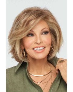 Raquel Welch in a past the chin light auburn lace front bob wig