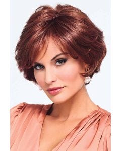 Woman in a chin length dark auburn layered lace front bob wig with side bangs