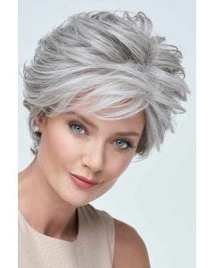 Raquel Welch in a short, choppy light auburn lace front wig