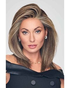 Woman in a past the shoulders dark brown lace front wig with long layers