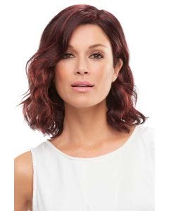 Woman in a wavy shoulder length black and red lace front wig