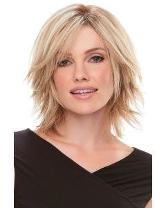 Woman in a 6" to 8" layered blonde wiglet hair topper