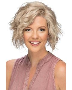 Woman in a chin length stacked curly blonde lace front wig