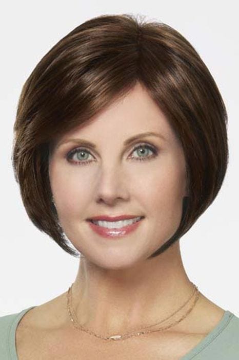 Woman in a chin length medium brown stacked lace front bob wig