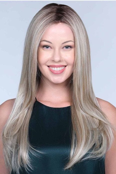 Woman in an extra long ash blonde lace front wig