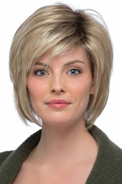 chin length layered wig with side swept bangs and a rounded shape