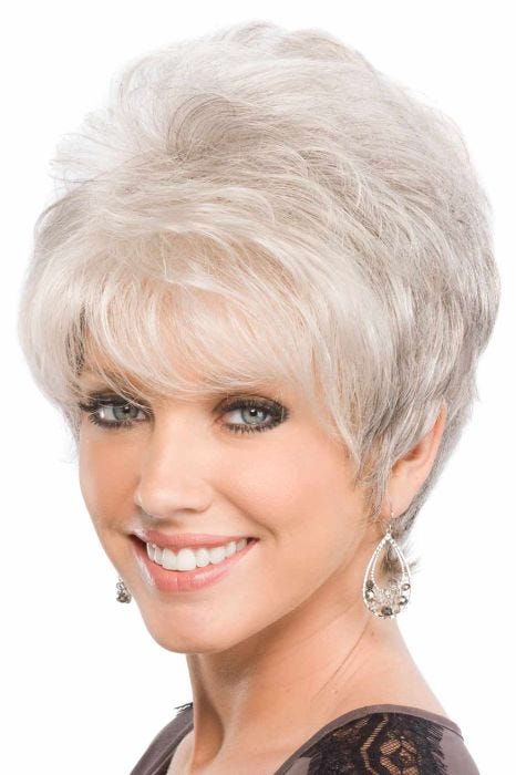 Woman in a petite teased long light grey pixie wig with side bangs